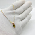 Emerald necklace on Collarbone