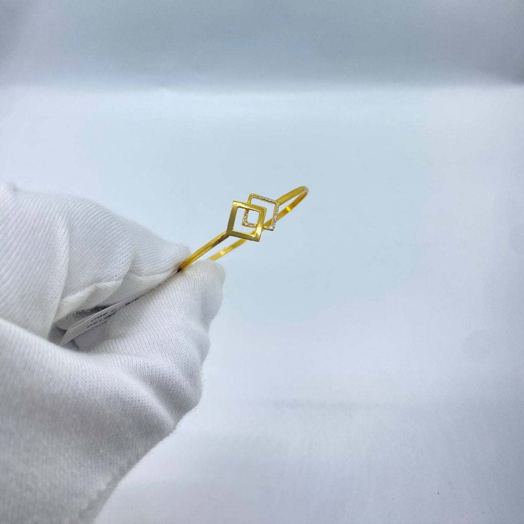 Geometric silver yellow bangle