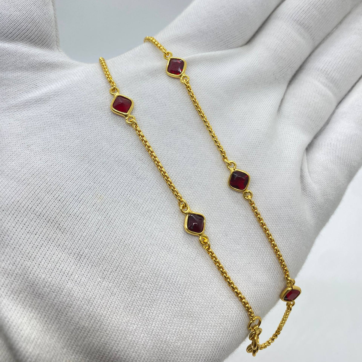 Ruby-Accented Gold Anklets