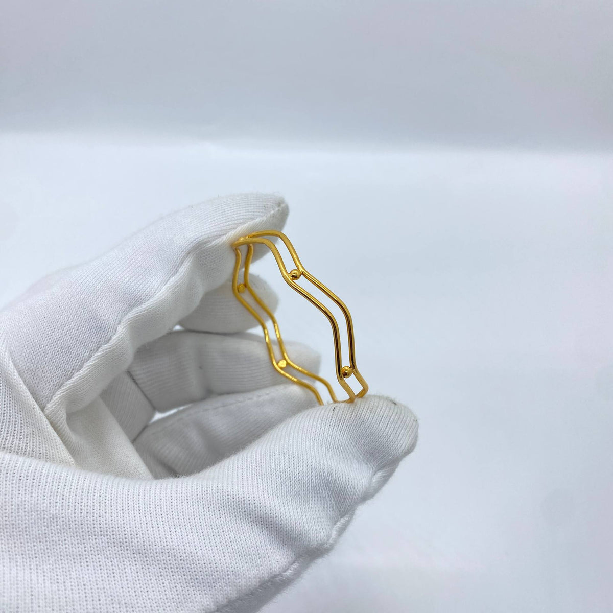 Wave Frame Gold Bangle